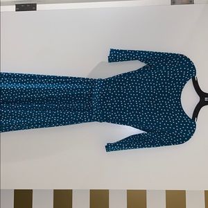 Turquoise polka dot jersey dress.